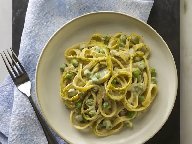 Fettuccine Pasta with Cream, Barilla® Rustic Basil Pesto and Peas Recipe | US_PROD-0b8493ef-e607-4df1-b355-4d453ed7e81f